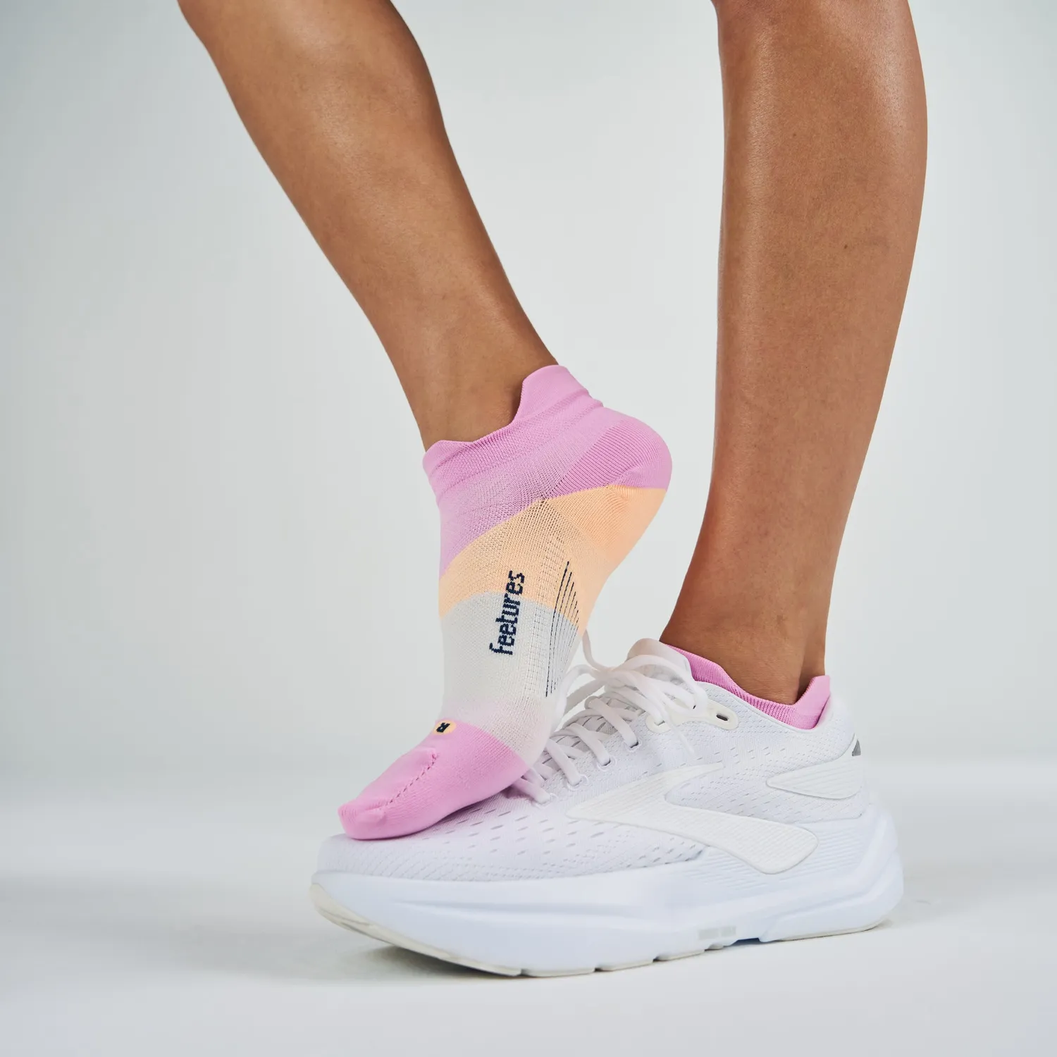 Feetures Elite Ultra Light No Show Tab løbesokker Pink Citrus tynd